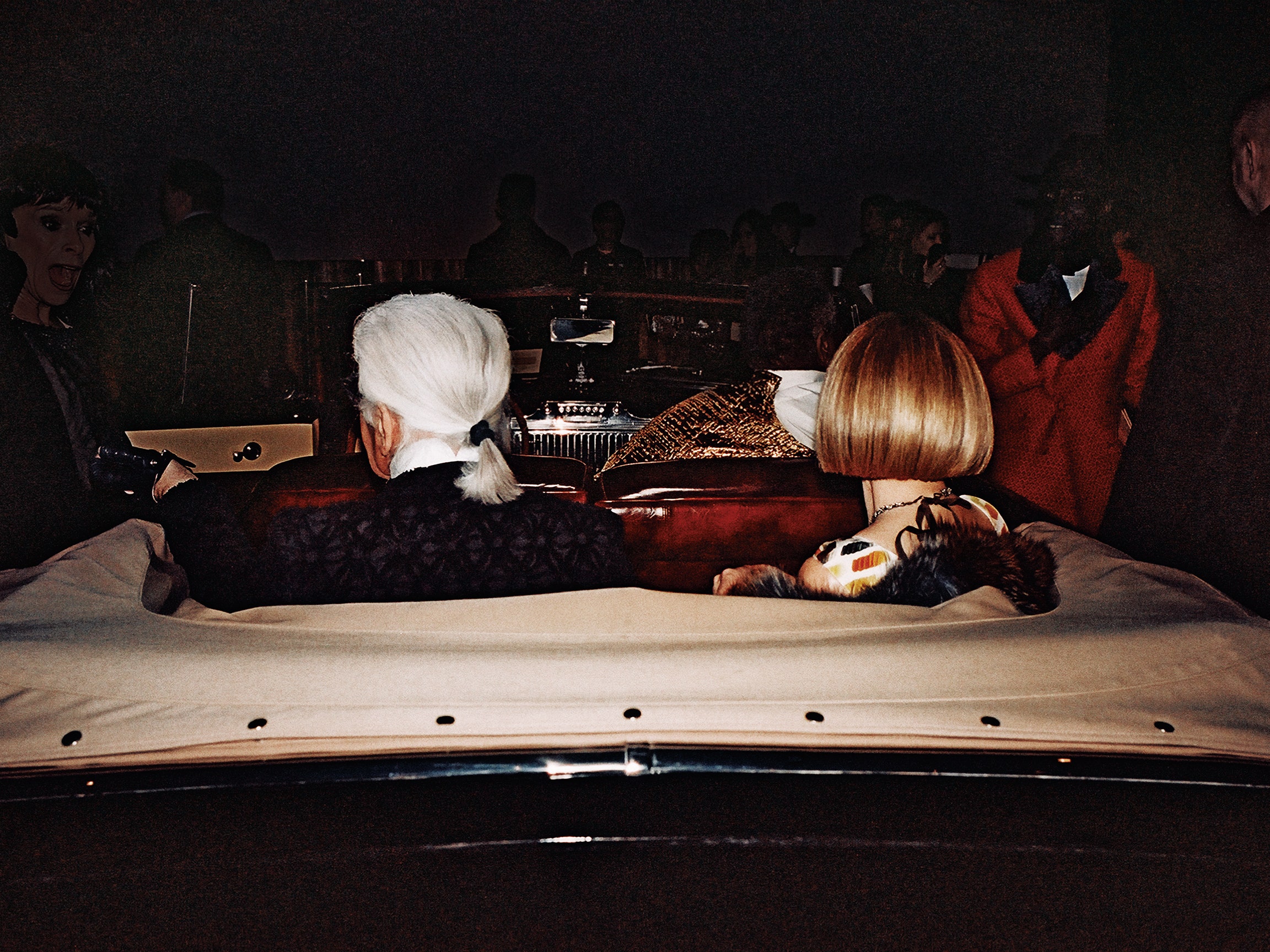 TAKE THE WHEEL Wintour with Lagerfeld at the drivein theater Chanel staged in Dallas 2013.
